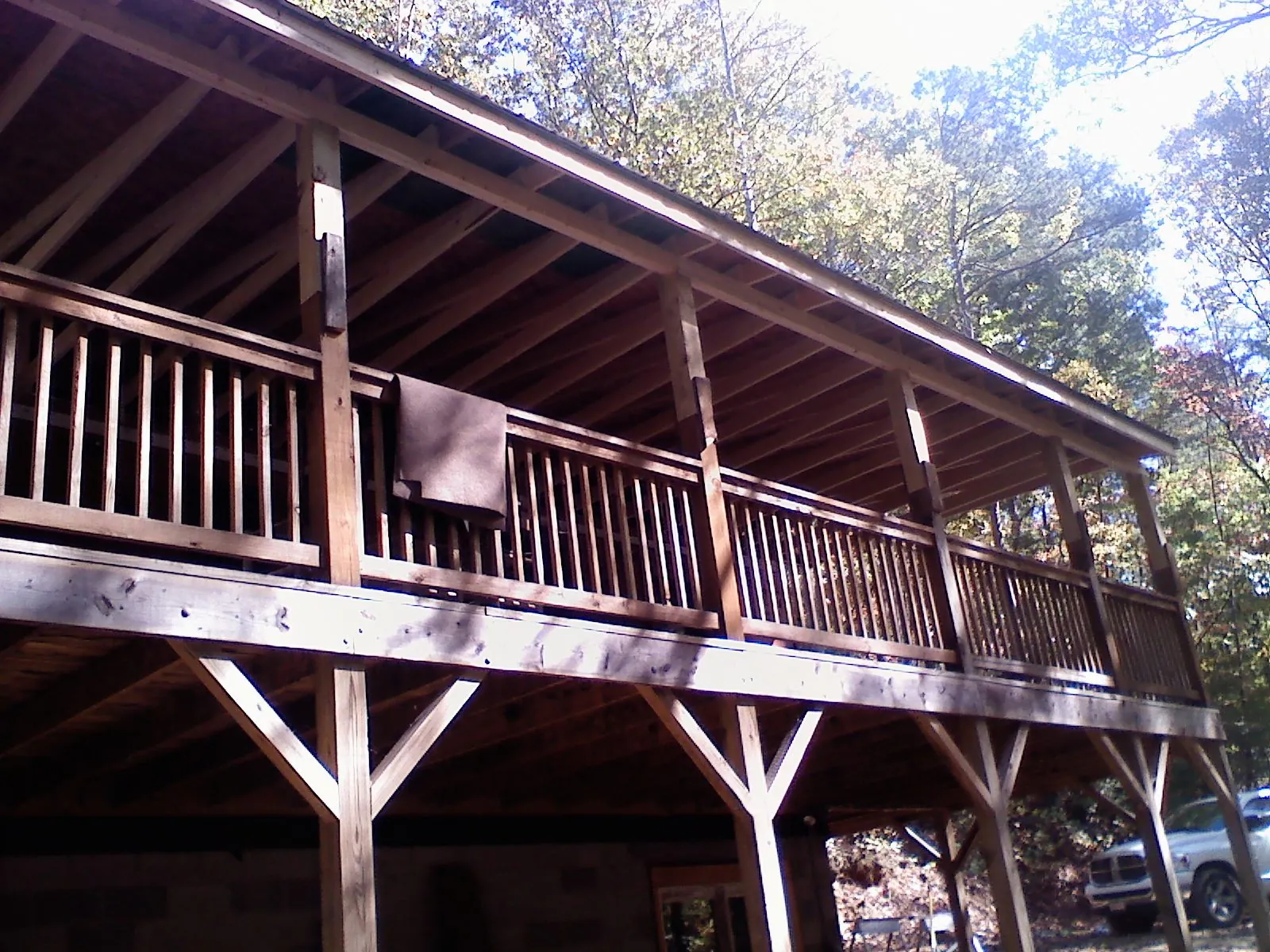 Timber framing under a new elevated porch and deck — Roof Leak Repair in Vernon Hills by Roofing Brothers